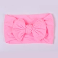 Hot pink baby headband with a soft rib-knit nylon bow for infants and toddlers - Bright Pink
