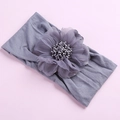 Soft grey nylon baby headband featuring a large layered chiffon flower decoration - Gray