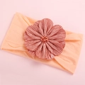 Elastic baby nylon headband featuring a large peach satin floral ornament with beads - Orange