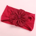 Macro shot of large red satin flower on soft nylon headband with beaded center detail - Red