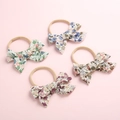 Set aus 4 weichen Baumwoll-Stirnbändern mit Blumenmuster und Nylonband für Babys - Zufällig gemischt