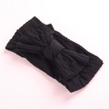 Detail of black cable knit headband featuring a large textured bow for children - Black