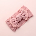 Détail du bandeau jacquard rose pour bébé avec un grand nœud et des pompons mignons - Rose Poudré Foncé