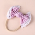 Close-up of baby headband with purple lace bow and soft high-elastic nylon band - Taro Purple