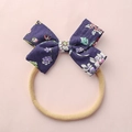 Fascia per capelli neonata con fiocco floreale viola scuro ed elastico in nylon - Stile Floreale Viola Scuro