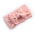 Soft nylon baby headband with white polka dots and a large decorative bow in light pink - Dusty Pink