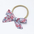 Detailed texture of cotton floral bow and soft nude nylon headband for infants - Red Floral (Style 6)