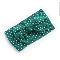 Detail of green bow headband with white polka dots and soft nylon knit texture - Dark Green