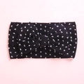 Soft black nylon baby headband with white polka dots and a large decorative bow - Black