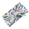 Bandeau bébé imprimé floral avec grand nœud et tissu tricoté doux sur fond blanc - Floraison Printanière