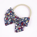 Navy floral bow headband for babies made with soft combed cotton and nylon strap - Red Floral