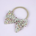 Floral print baby bow headband with soft nude nylon band and pink yellow blossoms - Little Floral