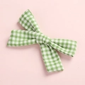 Cute green and white houndstooth cotton bow hair clip for girls and toddlers - Hair Bow / Green Checkered