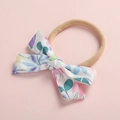 Dettaglio fiocco in cotone a fiori su fascia elastica in nylon morbido per neonati - Stampa bianca