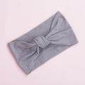 Detail shot of the soft grey nylon knot headband showing the fine knitted texture and fold - Gray (4)