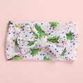 Close-up of baby headband with Christmas tree pattern and oversized bow detail - Christmas Tree