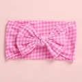 Detail of pink gingham bow headband for infants made of soft and elastic knit fabric - Red Plaid