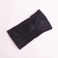 Detail of soft black nylon baby headband with classic knot design on flat background - Black(19)