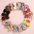 Vue à plat de 18 couleurs de bandeaux bébé en velours avec élastiques en nylon souples - Mélange Aléatoire