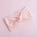 Detail of soft baby nylon headband showing elastic knitted texture and central knot design - Dark Pink (5)
