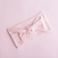 Detailed view of a soft pale pink knotted nylon baby headband with knitted texture - Pale Pink (6)