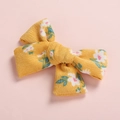 Detail of yellow floral corduroy bow hair clip with textured ribbing for girls - Yellow Floral