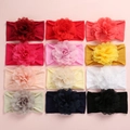 Flat lay of 12 multi-color chiffon flower nylon headbands for babies in neat array - Mixed Random