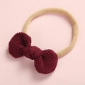 Détail du nœud en velours côtelé doux sur bandeau en nylon beige pour bébés bordeaux - Bordeaux