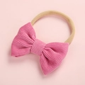 Détail du nœud en velours côtelé rose et bandeau en nylon souple pour bébés - Rose (8)