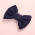 Dark blue corduroy bow hair clip for girls featuring a classic ribbed texture on pink background - Dark Blue