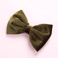 Detailed close-up of an olive green velvet bow hair clip with a soft textured finish - Army Green