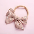 Detail of soft nylon baby headband with pink striped floral bowtie for infants - 10*6.5 Pink