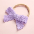 Detail of lavender knitted bow with soft texture and high-stretch nylon baby headband - Purple