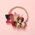 Detailed close-up of soft nylon baby headband with pink floral clusters and green leaves - Deep Rose and Light Pink Cluster Style (12)