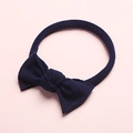 Detail of soft navy blue nylon baby headband with ribbed texture and elastic bow design - Navy Blue