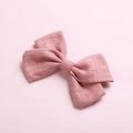 Detailed texture of dusty rose cotton bow hair clip with rustic woven fabric finish - Dusty Pink