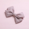 Close-up of light purple cotton bow hair clip showing detailed woven fabric texture - Dark Dusty Pink