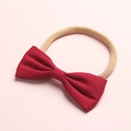Dettaglio della fascia per neonati con fiocco in lino rosso e elastico in nylon - 12-Rosso Acceso