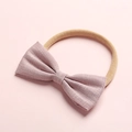 Dettaglio del fiocco in cotone e lino rosa con fascia in nylon morbido per neonati - 18-rosa