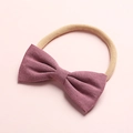 Dettaglio del fiocco in lino rosa antico su fascia in nylon morbido per neonati - 10-Rose Bean Paste
