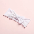 Close-up of soft white microfiber baby headband with a large decorative bow - White