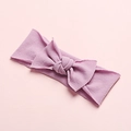 Macro shot of light purple seamless nylon baby headband with soft ribbed texture bow - Taro Purple