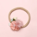 Detailed close-up of handmade fabric and mesh flower baby headband on a pink backdrop - Tulle 3D Pink Decoration (14)
