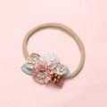 Detailed view of handmade mesh flower headbands for toddlers in pink and beige colors - Nude Elastic Four Color Floral (13)
