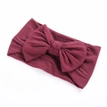 Soft nylon baby headband with a large burgundy bow for infants and toddlers - Burgundy