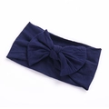 Soft nylon baby headband with a large navy blue bow, elastic headwear for infants - Navy Blue