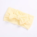 Super soft yellow nylon headband with large fabric bow for babies and toddlers - Beige