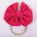 Close-up of rose red waffle fabric double layered bow with high elastic nylon headband - Rose Red Style (#4)
