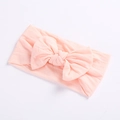 Soft nylon light pink baby headband featuring a large elastic bow for infants - Dark Pink