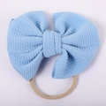 Detailed view of light blue waffle fabric bow with high elastic nylon headband for babies - Light Blue Waffle Style (#14)